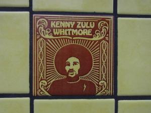 Billy X holding a Free Zulu Teeshirt